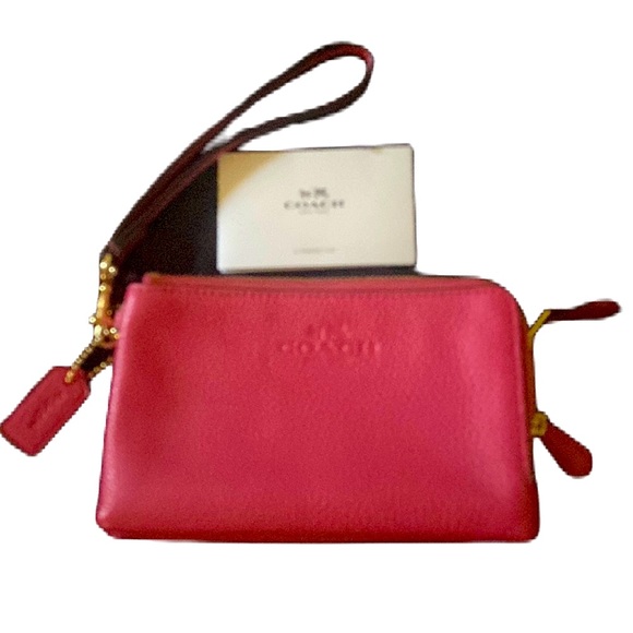 Coach Handbags - COACH Hot pink wallet wristlet double zip wear everywhere